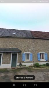 a brick house with blue shutters on it at La campagne vallée de Chevreuse à 35 KM de Paris in Fontenay-lès-Briis