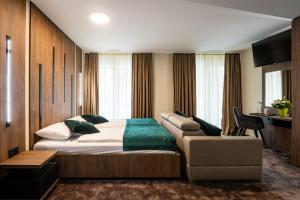 Postel nebo postele na pokoji v ubytování The Gate Boutique Hotel Zürich