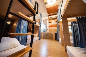 Postel nebo postele na pokoji v ubytování D.C. Inn