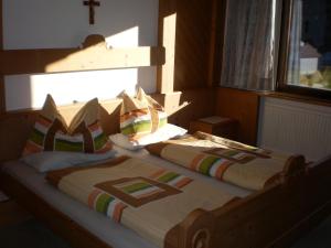 Postel nebo postele na pokoji v ubytování Haus Bergfried