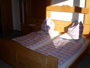 Postel nebo postele na pokoji v ubytování Haus Bergfried