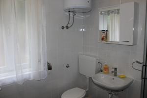 Kúpeľňa v ubytovaní Apartment MIS Floura