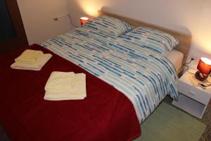 Posteľ alebo postele v izbe v ubytovaní Apartment MIS Floura