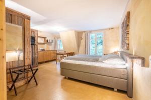 Postel nebo postele na pokoji v ubytování Hotel Wetterhorn