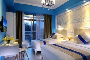Postel nebo postele na pokoji v ubytování Care Hotel Coast Collection