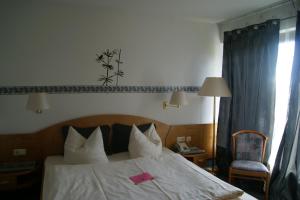 Кровать или кровати в номере Hotel Papendoor