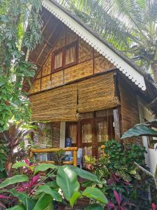 Κήπος έξω από το Latitude 10 Siargao