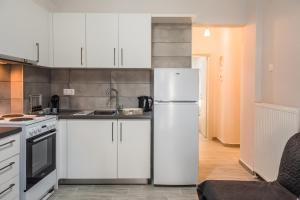 Kuchyňa alebo kuchynka v ubytovaní Freesia #colony_Urban_apartment