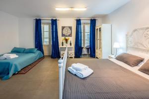 Säng eller sängar i ett rum på La Vallette