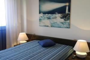 Posteľ alebo postele v izbe v ubytovaní Blue Home