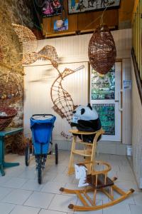 Photo de la galerie de l'établissement Gite Panda La Sylve, à Tenneville