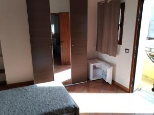 Postel nebo postele na pokoji v ubytování Room and Breakfast I Gemelli