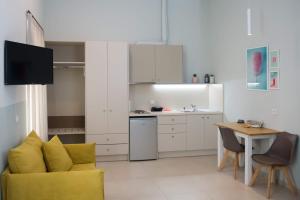 Η κουζίνα ή μικρή κουζίνα στο Stylish Studio Apartment - 1 House