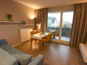 Posedenie v ubytovaní Apartament z HUŚTAWKĄ Bel Mare