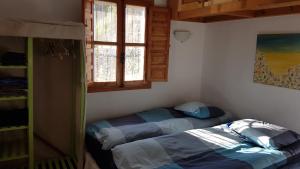 Posteľ alebo postele v izbe v ubytovaní Casa Feliz