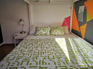 Łóżko lub łóżka w pokoju w obiekcie Lau Haizeta Beach
