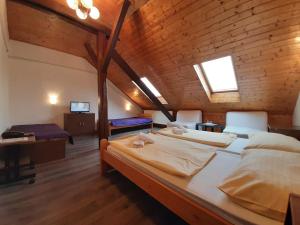 Postel nebo postele na pokoji v ubytování Hotel Olga