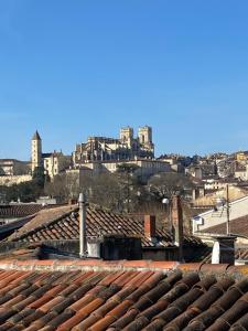 a view of a city from the roofs of buildings at Le Relais de Gascogne in Auch