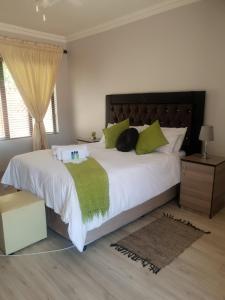 A bed or beds in a room at Vaticious