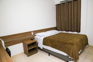 Kaluff Hotel客房内的一张或多张床位