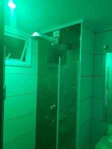 Ванная комната в Hotel Recanto das Perdizes