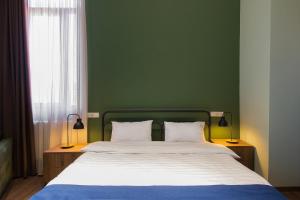 Letto o letti in una camera di Mtevino