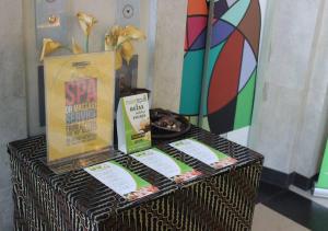 a table with a display of food and a bag at MaxOneHotels.com at Sabang in Jakarta