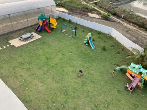 an aerial view of a playground with kids on it at White Hunter B&B in Tainan