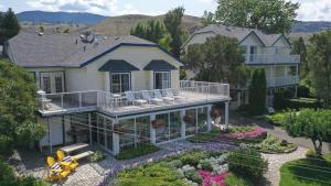 an aerial view of a house with a garden at Lakeside Country Inn in Savona