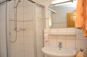 
Ein Badezimmer in der Unterkunft Waldhotel Hubertus
