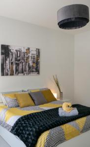 Voodi või voodid majutusasutuse Mgarr Waterfront Cosy Apartment 2 by Ghajnsielem Gozo toas