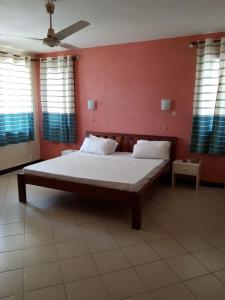 Кровать или кровати в номере Paradise Resort Apartments