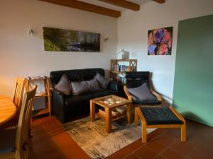 Χώρος καθιστικού στο Ferienhaus Uferweg