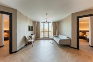 Voodi või voodid majutusasutuse KOMOREBI BAKURIANI RESORT toas