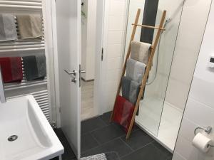 Koupelna v ubytování Ferienwohnungen Scheuring 1.OG + 21 fotografií