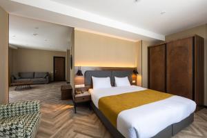 Voodi või voodid majutusasutuse KOMOREBI BAKURIANI RESORT toas