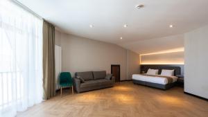 Voodi või voodid majutusasutuse KOMOREBI BAKURIANI RESORT toas