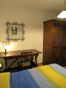 Il Molino Di Serravalleにあるベッド
