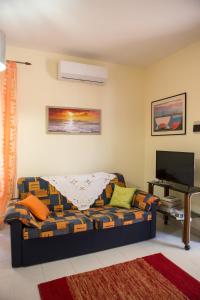 Μια τηλεόραση ή/και κέντρο ψυχαγωγίας στο Casa Vacanze Soledad