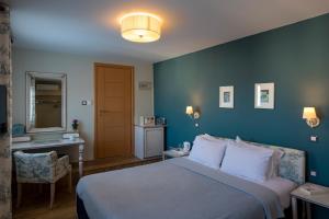 Postel nebo postele na pokoji v ubytování Leto Nuevo Hotel