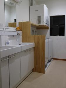Η κουζίνα ή μικρή κουζίνα στο Shiroyamasou