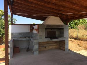 A kitchen or kitchenette at Casa Lambuh