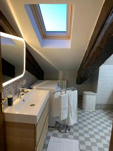 Ett badrum på Casa Jaqueline ( Attico )