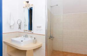 Ванна кімната в Aspro Mple
