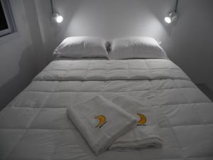 เตียงในห้องที่ Prachan Hostel