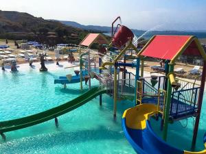 a water park with a slide in the water at Atlantis in Crotone