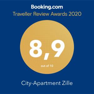 ベルリンにあるCity-Apartment Zilleの黄色の円 旅行レビューアワード シティ アパートメント ジル