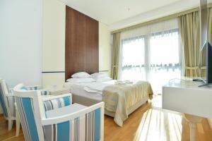 TV a/nebo společenská místnost v ubytování BARBETA Accommodation