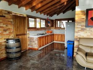 Köök või kööginurk majutusasutuses Hotel Chalet San Juan de Ticlan