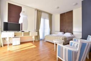 TV a/nebo společenská místnost v ubytování BARBETA Accommodation